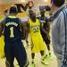 Michigan senior Corey Person reacts as he jokes around with his teammates in front of the camera during media day at the Player Development Center on Wednesday. Melanie Maxwell I AnnArbor.com